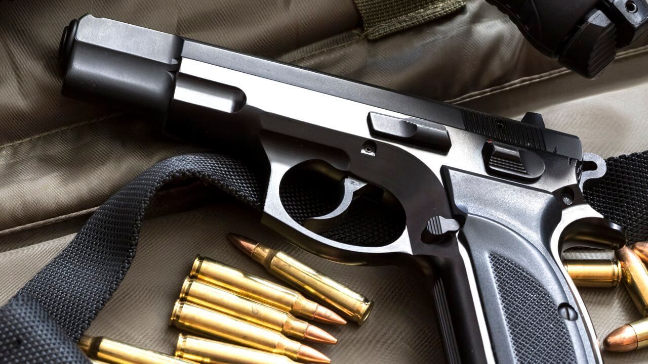 Handgun with ammo.